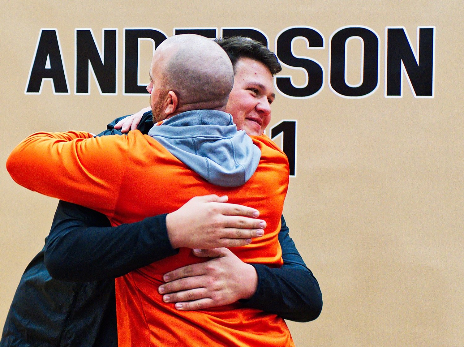 Jackson Anderson and Luke Blackwell hug after the ceremony.